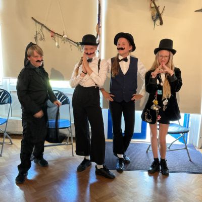 Children rehearsing for their play